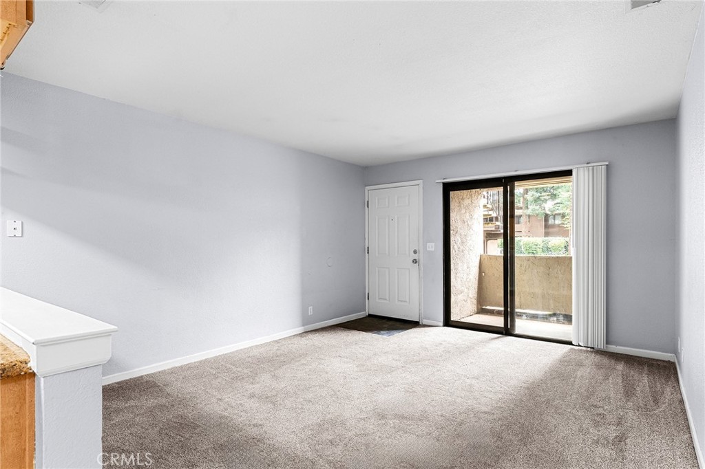 1114 Nord Avenue, Unit 11 Chico, CA 95926 - Photo 22 of 47 a view of an empty room with a window