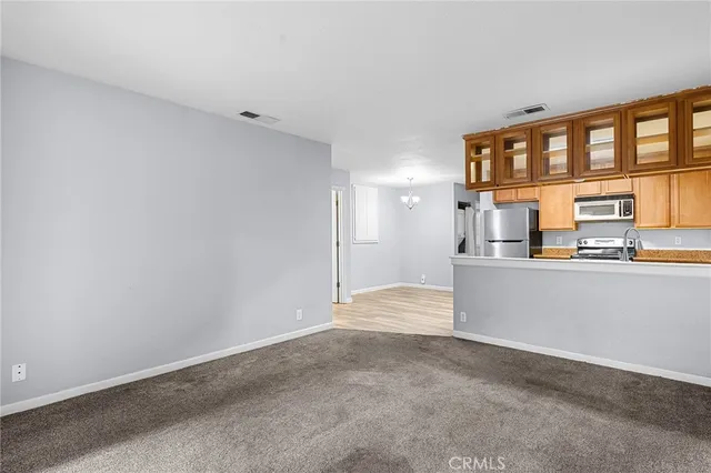 a kitchen with a refrigerator a sink and dishwasher