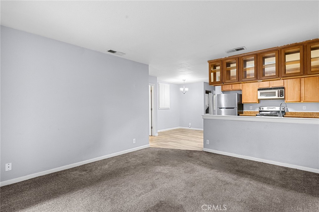 1114 Nord Avenue, Unit 11 Chico, CA 95926 - Photo 24 of 47 a view of an empty room with a window