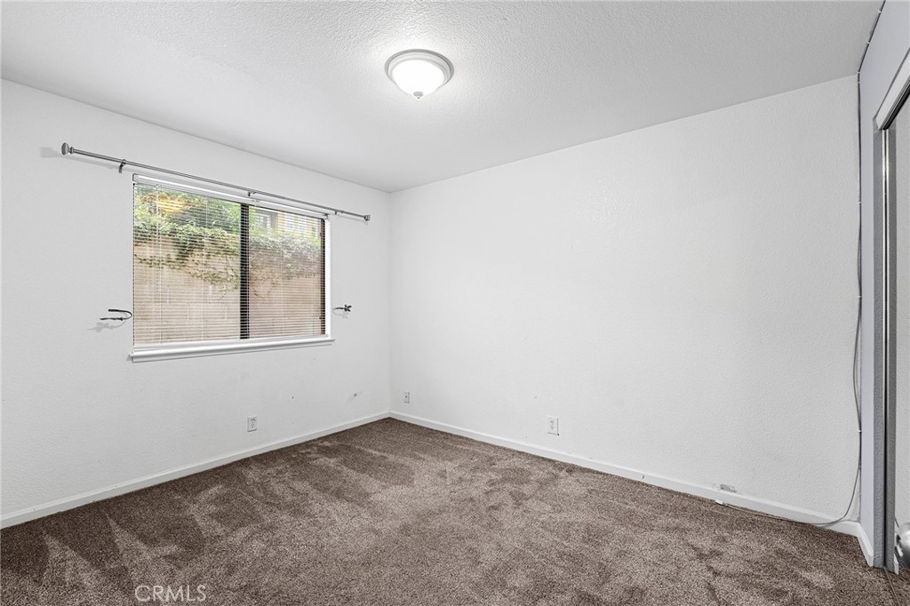 1114 Nord Avenue, Unit 11 Chico, CA 95926 - Photo 36 of 47 an empty room with a window