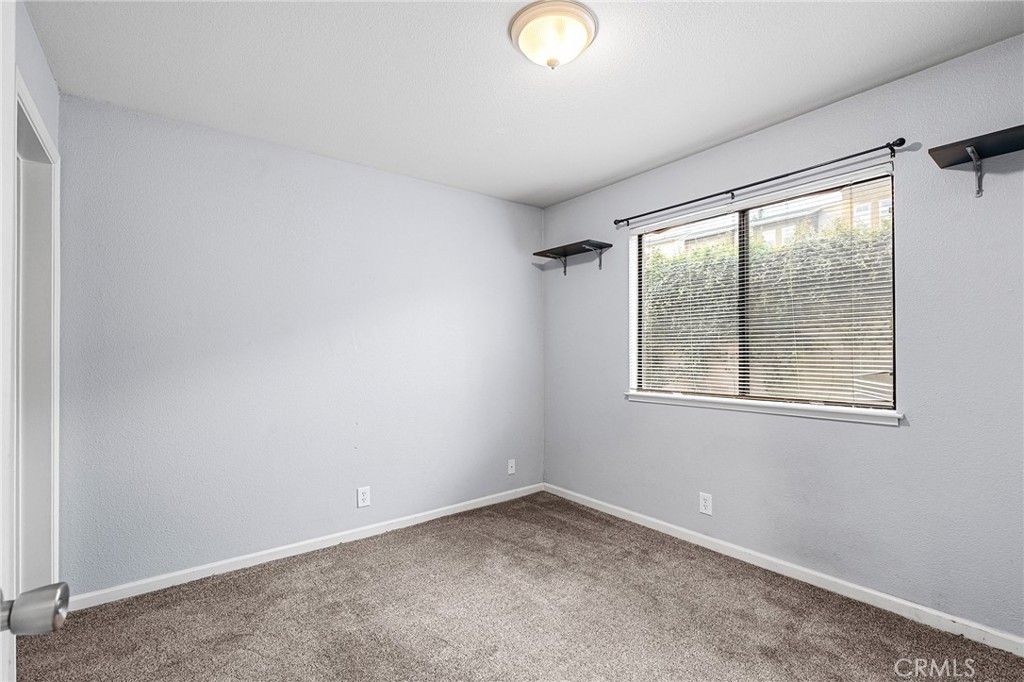 1114 Nord Avenue, Unit 11 Chico, CA 95926 - Photo 38 of 47 an empty room with a window