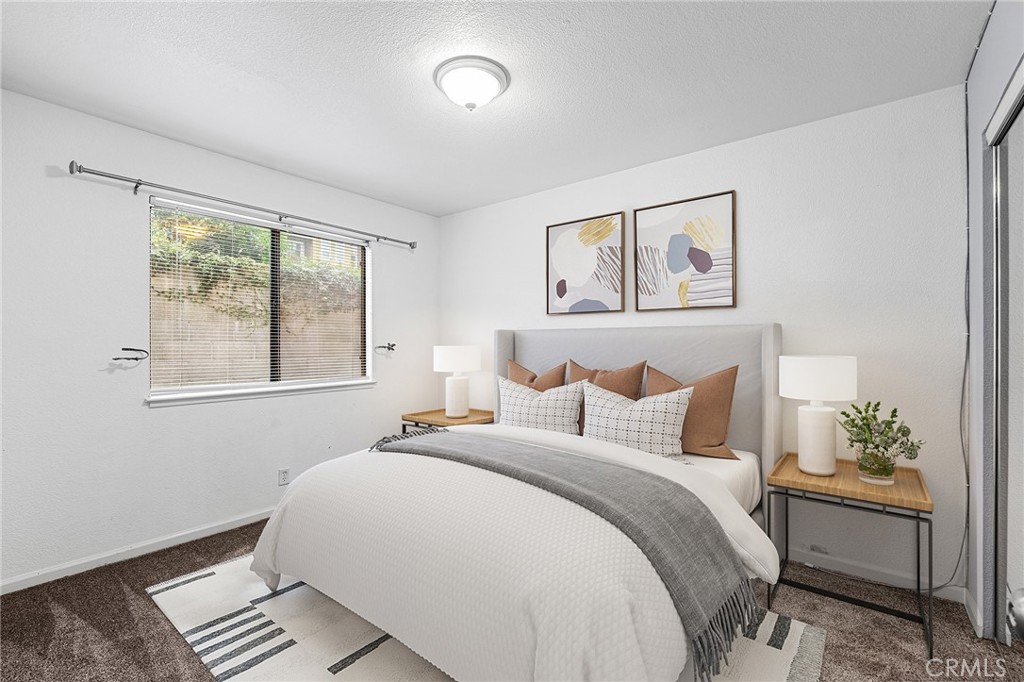 1114 Nord Avenue, Unit 11 Chico, CA 95926 - Photo 6 of 47 a bedroom with bed and window