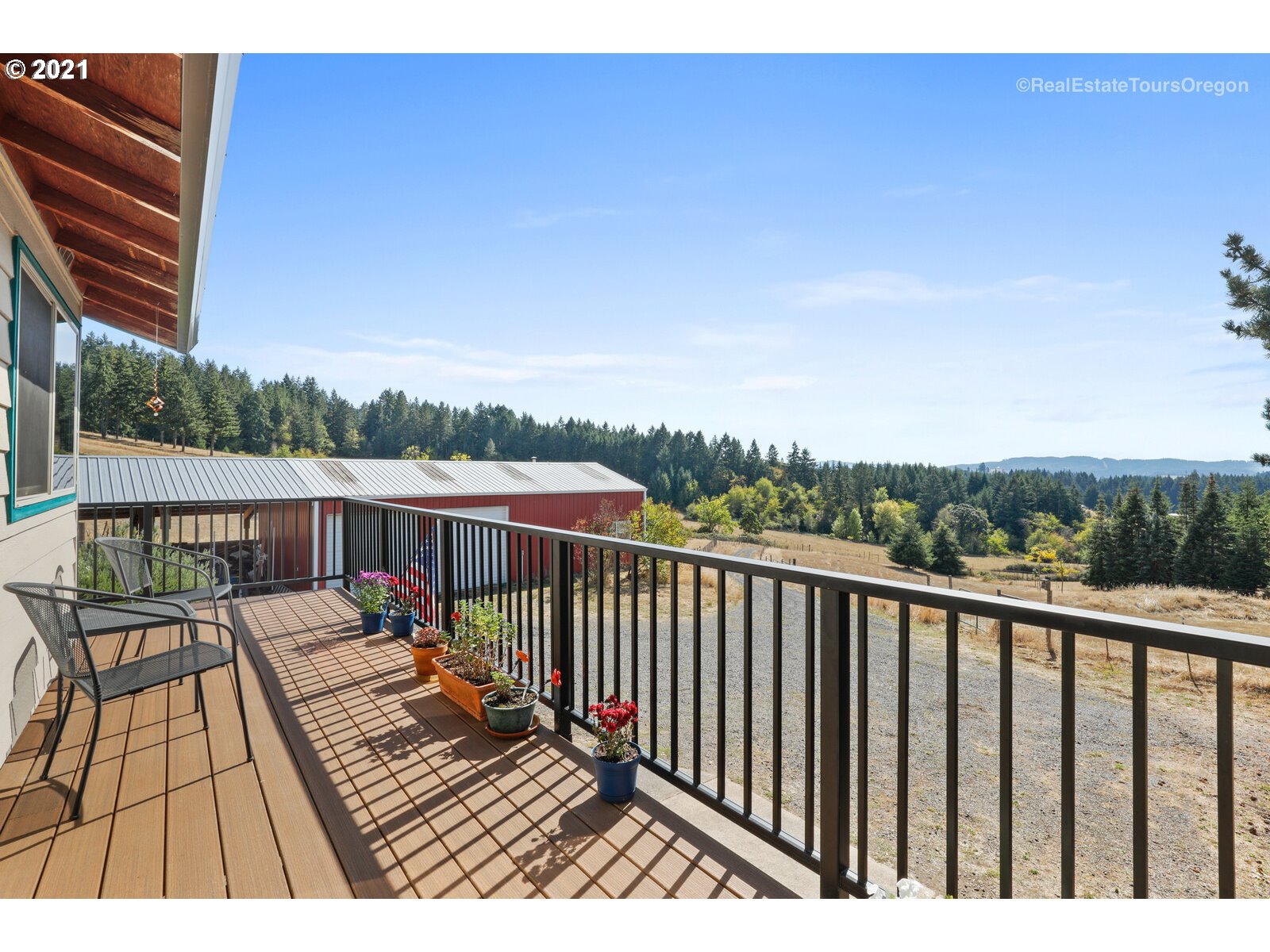 40965 Southwest Vandehey Road Gaston, OR 97119 - Photo 23 of 32 a view of balcony with wooden floor and fence