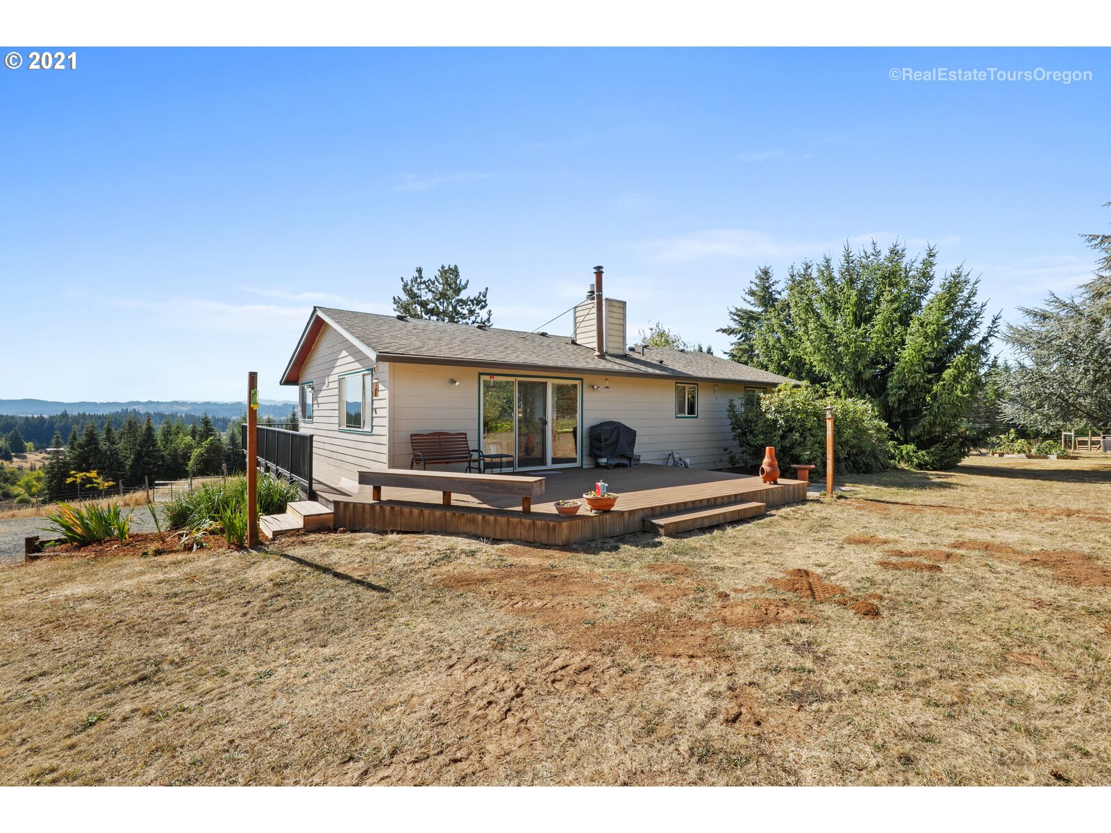 40965 Southwest Vandehey Road Gaston, OR 97119 - Photo 26 of 32 a view of a house with backyard and sitting area