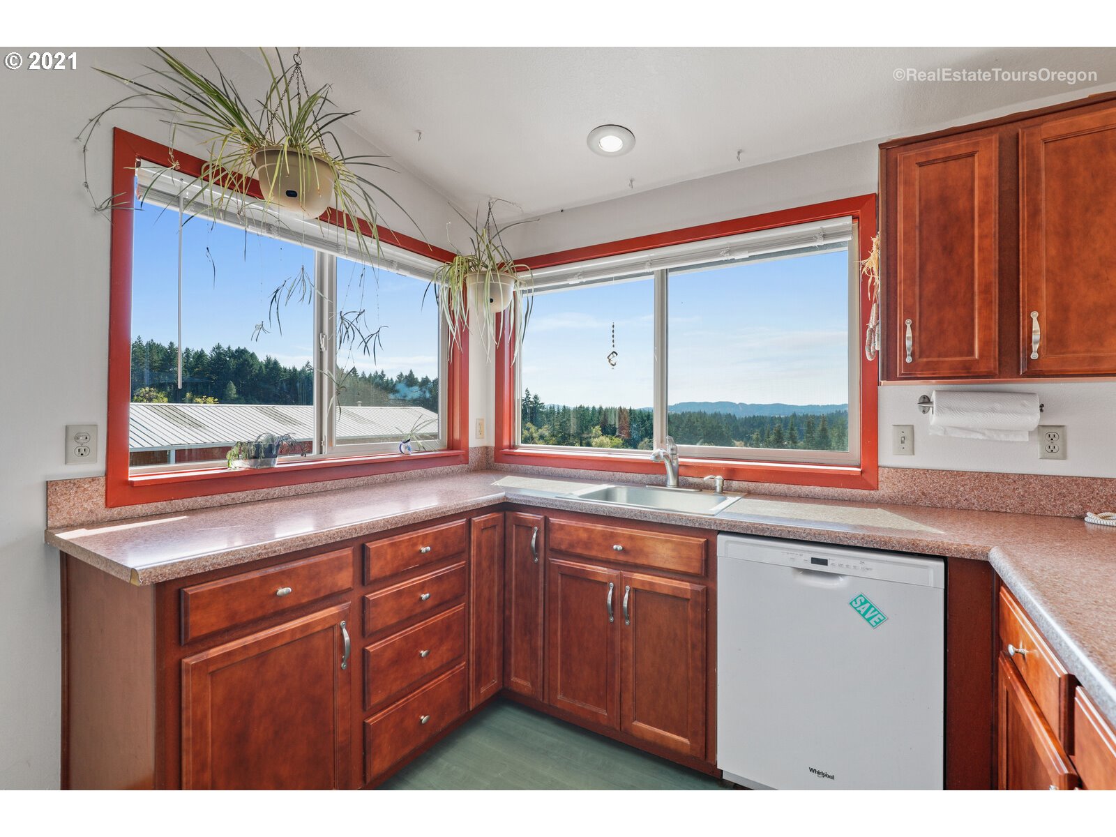 40965 Southwest Vandehey Road Gaston, OR 97119 - Photo 10 of 32 a kitchen with a sink a window and cabinets