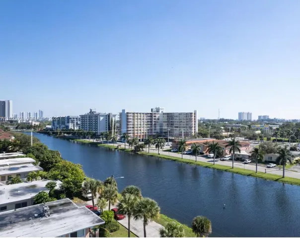 a view of a city and lake