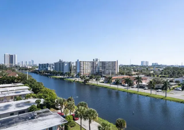a view of a city and lake
