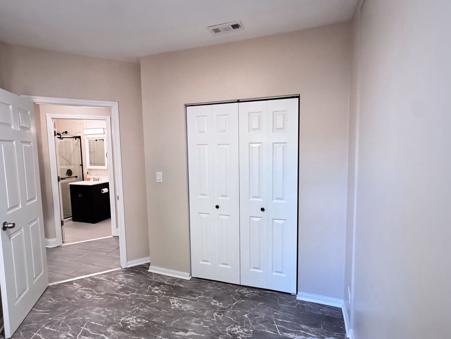 1315 West 18th Street, Unit 2 Chicago, IL 60608 - Photo 14 of 19 a view of a hallway with a room and a bathroom
