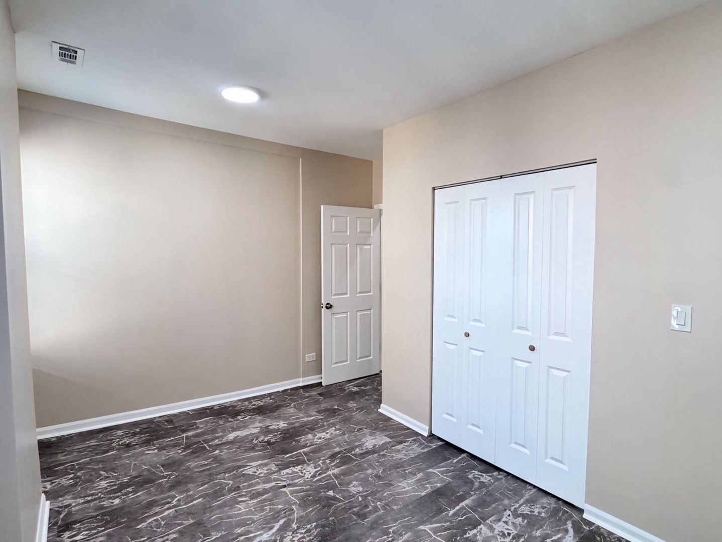 1315 West 18th Street, Unit 2 Chicago, IL 60608 - Photo 18 of 19 a view of an empty room