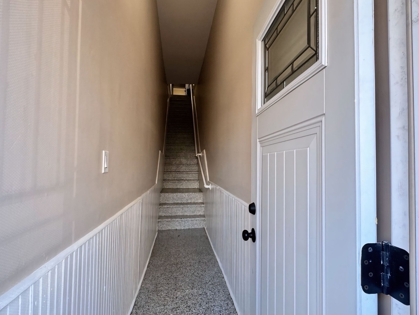 1315 West 18th Street, Unit 2 Chicago, IL 60608 - Photo 2 of 19 a view of a hallway with stairs