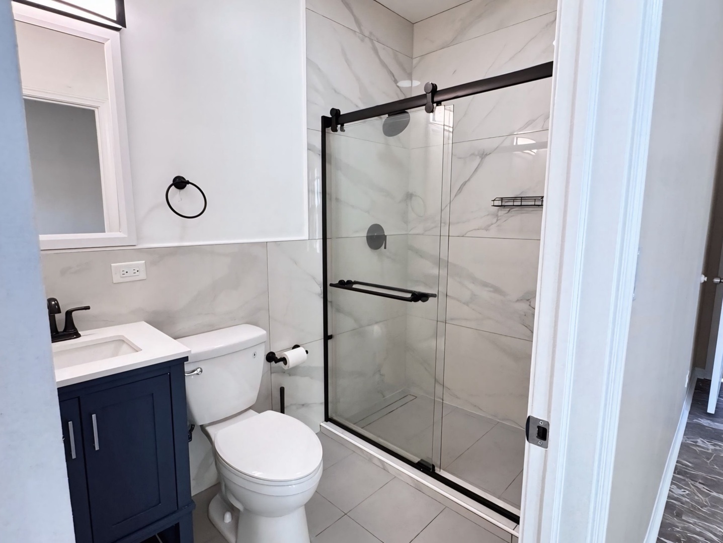 1315 West 18th Street, Unit 2 Chicago, IL 60608 - Photo 8 of 19 a bathroom with a toilet a sink and a shower