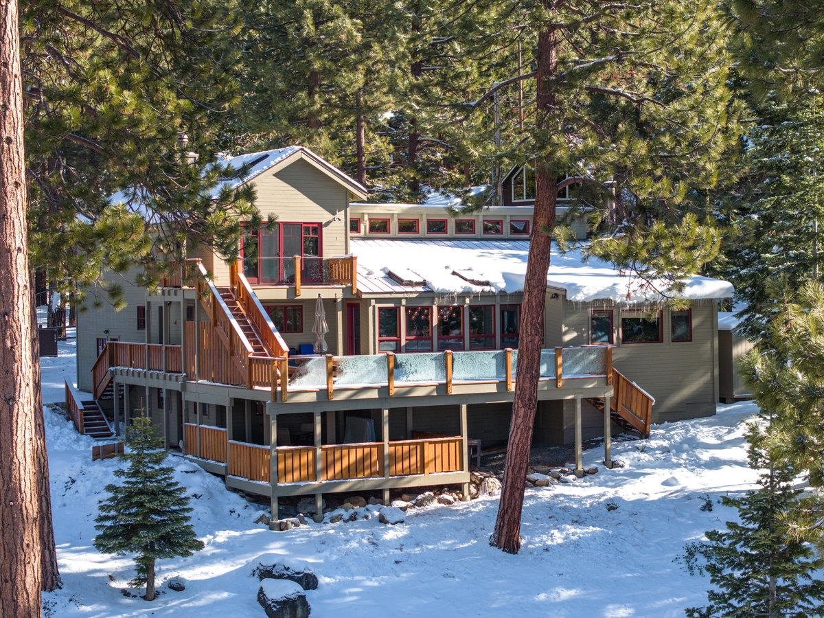 424 Chipmunk Street Kings Beach, CA 96143 - Photo 1 of 21 an aerial view of a house with a yard and balcony