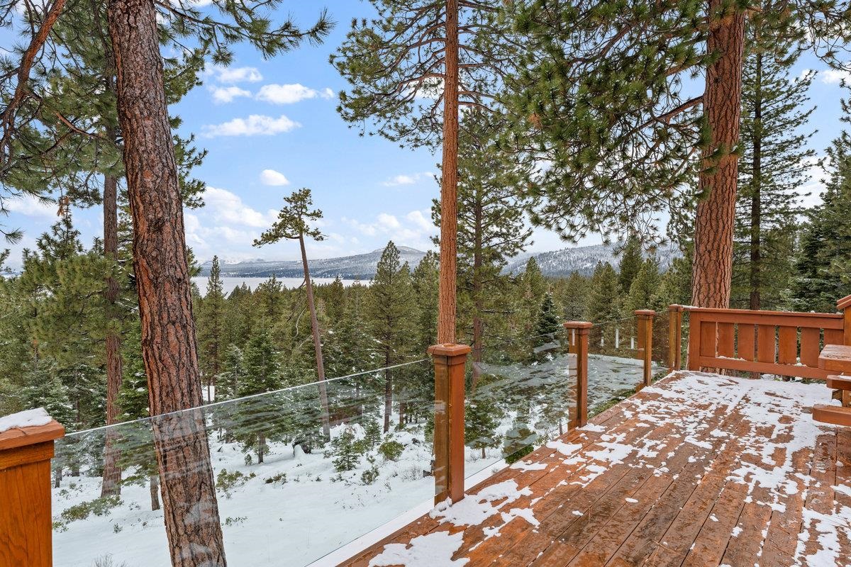 424 Chipmunk Street Kings Beach, CA 96143 - Photo 21 of 21 a view of a pathway with a tree in the background