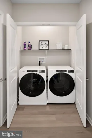 a bathroom with a bathtub and a mirror
