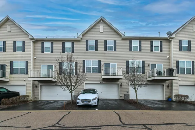 a front view of multiple houses