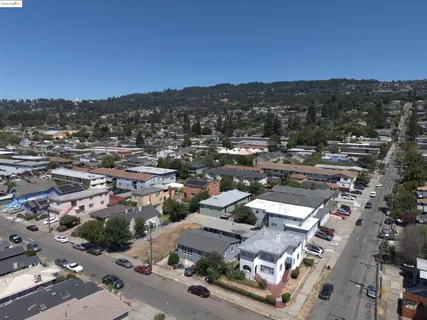 an aerial view of a city with lots of residential buildings