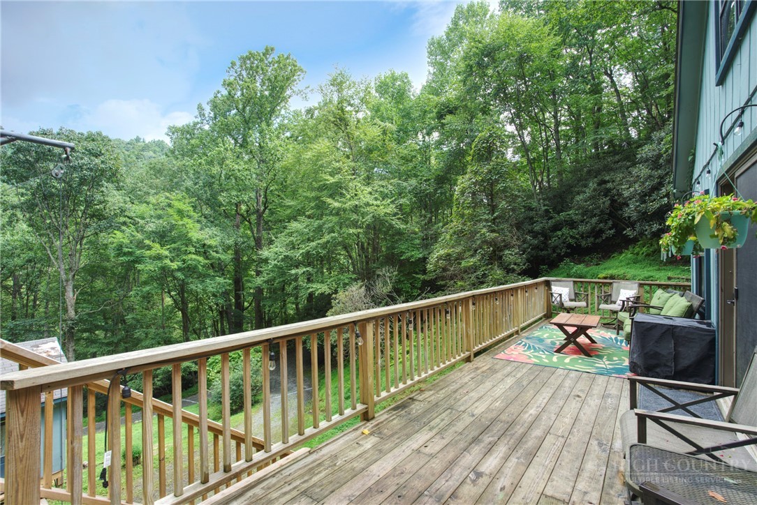 9440 Blackberry Road Lenoir, NC 28645 - Photo 3 of 30 a view of balcony with furniture