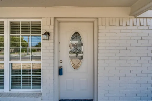 a bathroom with a granite countertop shower