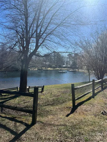 a view of a bench in the backyard