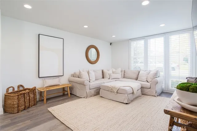 a bedroom with bed furniture and window