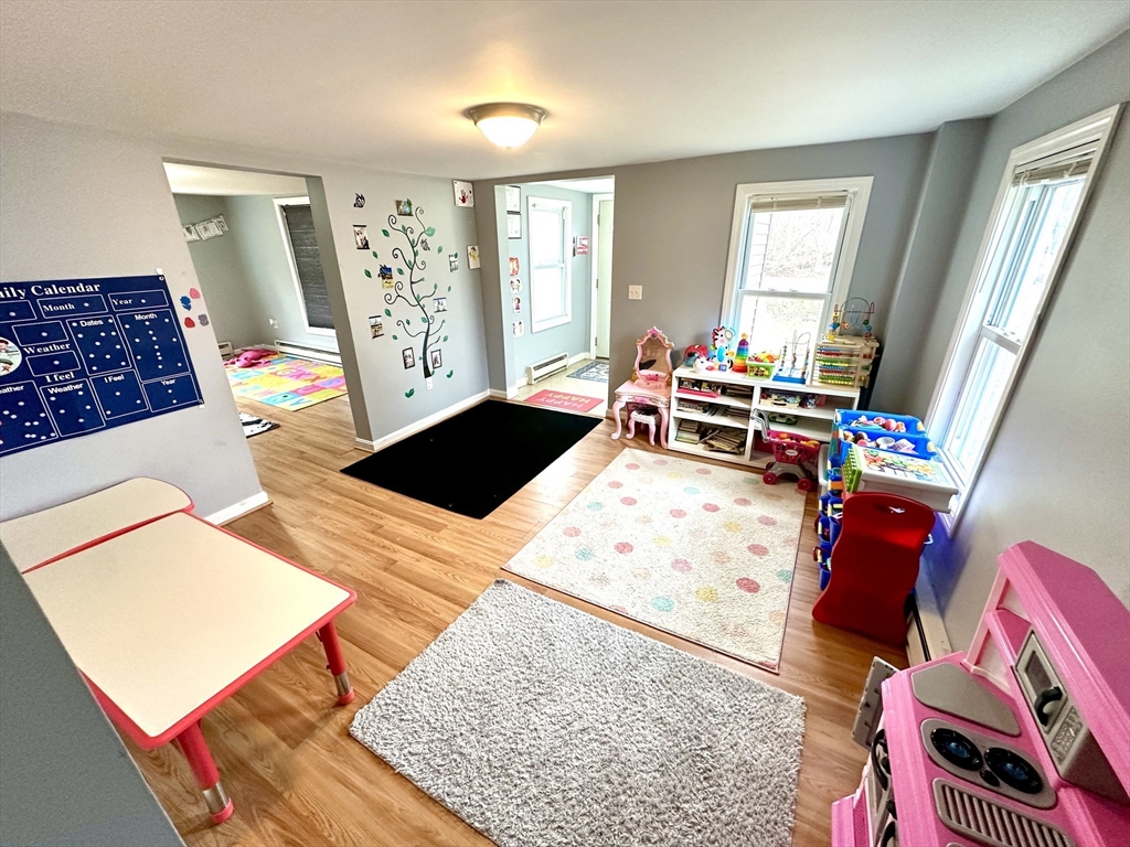 76 Everton Avenue Worcester, MA 01604 - Photo 11 of 38 a bedroom with a bed and a window