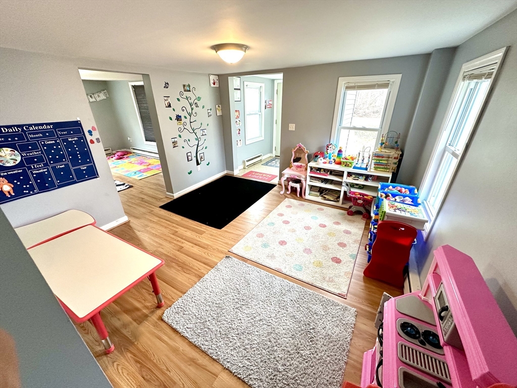 76 Everton Avenue Worcester, MA 01604 - Photo 12 of 38 a bedroom with furniture and a window