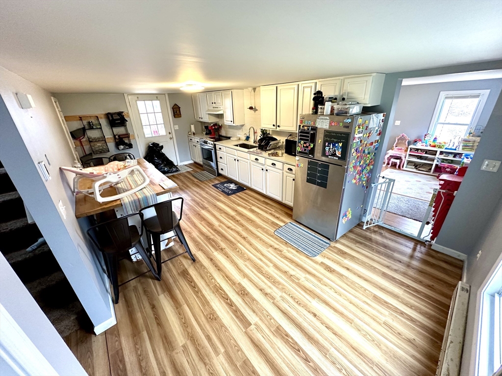 76 Everton Avenue Worcester, MA 01604 - Photo 14 of 38 a living room with furniture and a table