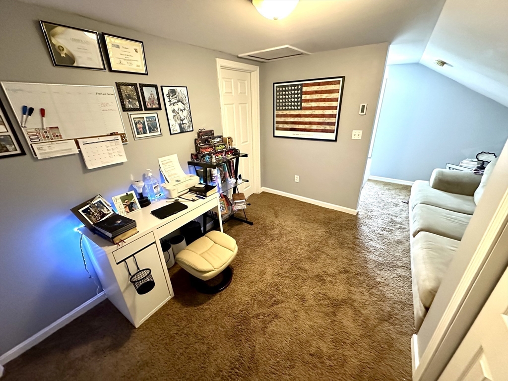 76 Everton Avenue Worcester, MA 01604 - Photo 18 of 38 a living room with furniture and a window