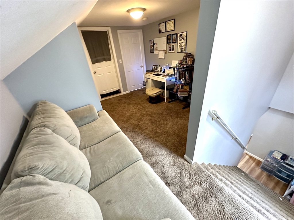 76 Everton Avenue Worcester, MA 01604 - Photo 19 of 38 a living room with furniture and a window