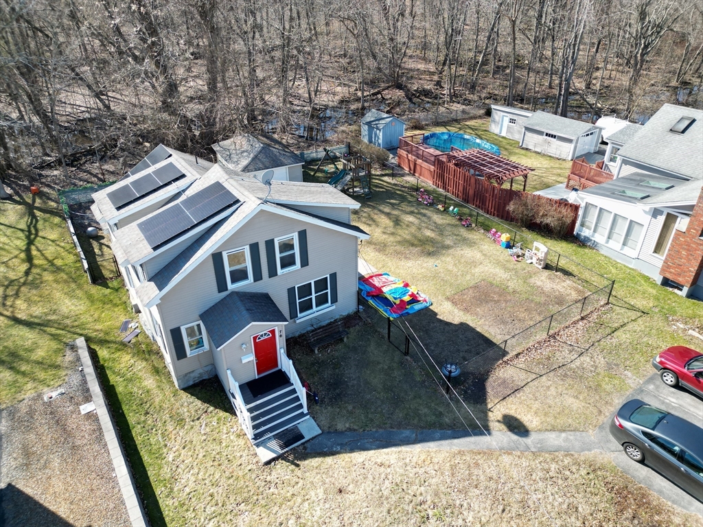 76 Everton Avenue Worcester, MA 01604 - Photo 2 of 38 a view of roof deck with a patio