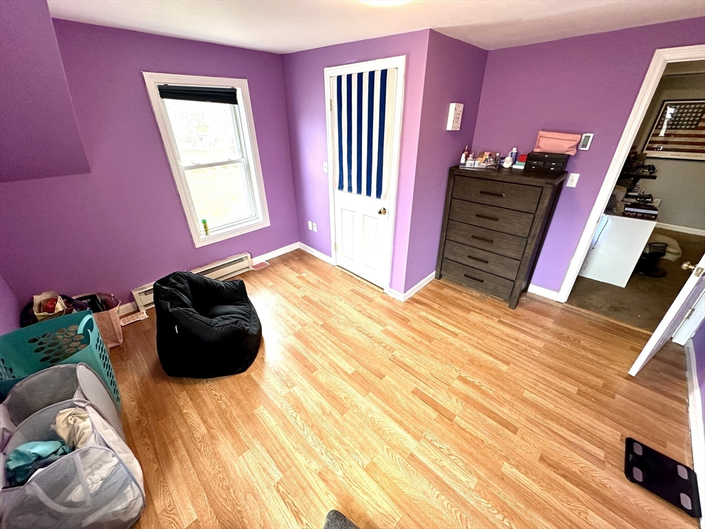 76 Everton Avenue Worcester, MA 01604 - Photo 22 of 38 a bedroom with a bed and a window