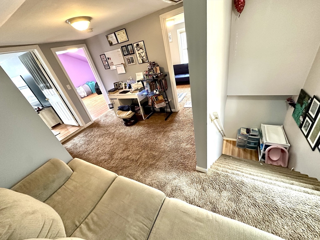 76 Everton Avenue Worcester, MA 01604 - Photo 27 of 38 a bedroom with furniture and a bed