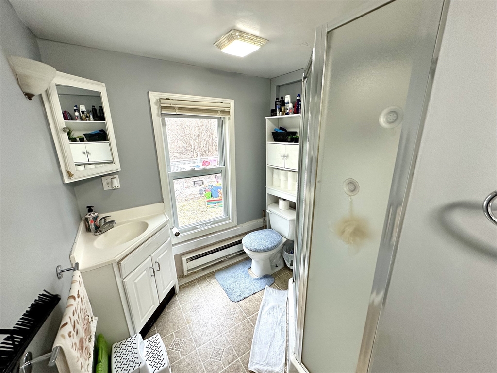 76 Everton Avenue Worcester, MA 01604 - Photo 30 of 38 a bathroom with a sink toilet and shower