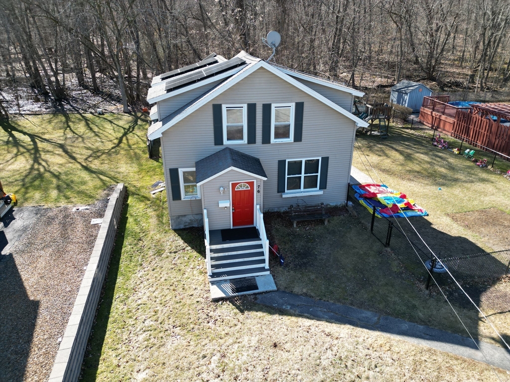 76 Everton Avenue Worcester, MA 01604 - Photo 36 of 38 a front view of a house with a yard