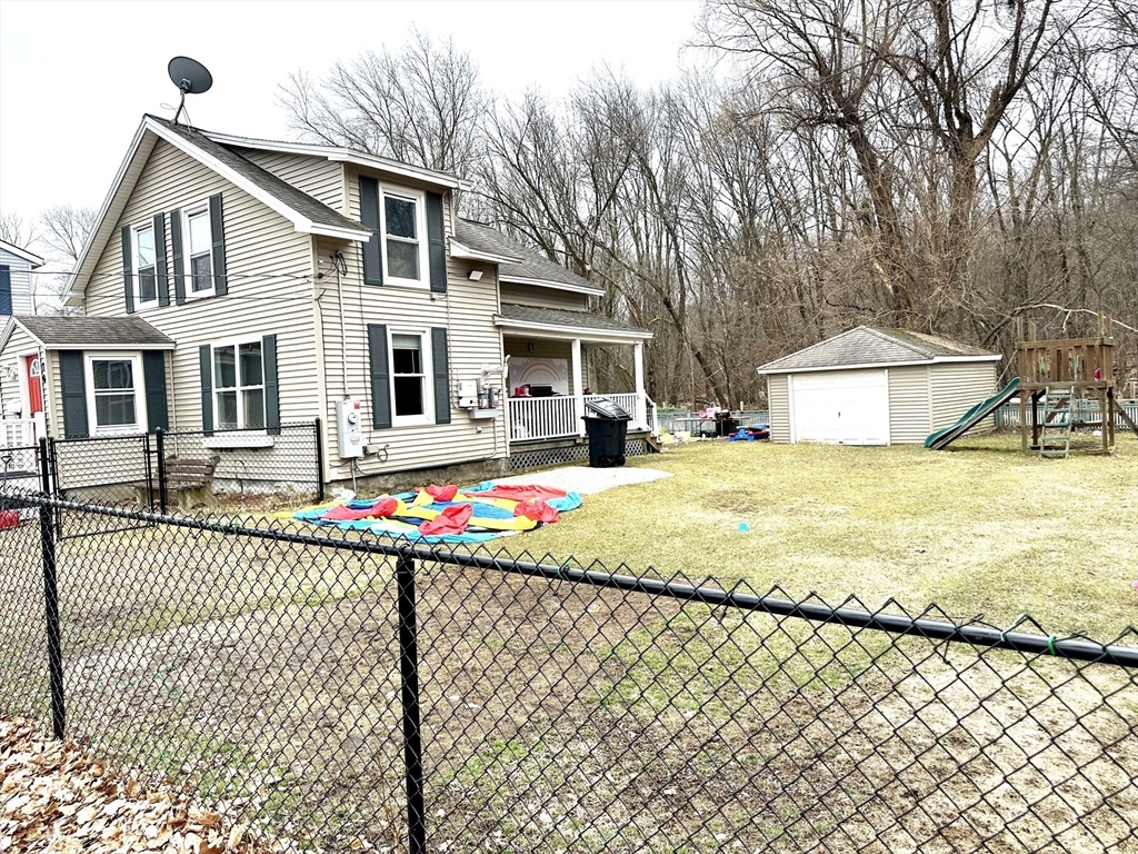 76 Everton Avenue Worcester, MA 01604 - Photo 38 of 38 a front view of a house with a yard