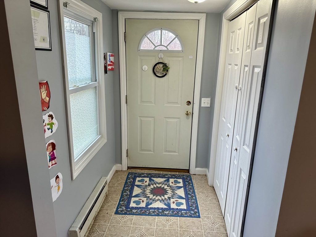 76 Everton Avenue Worcester, MA 01604 - Photo 6 of 38 a view of an entryway with wooden floor