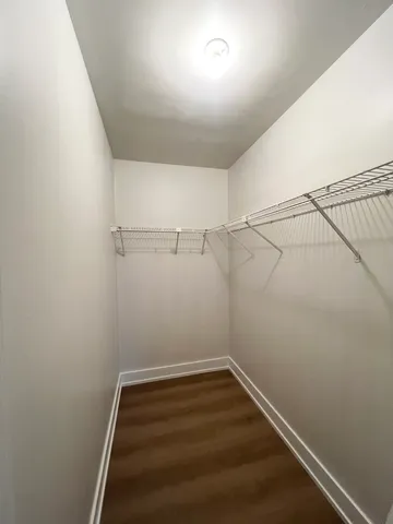 a view of a room with racks on the wall