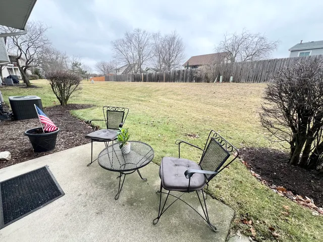 a view of a chairs and table on the terrace