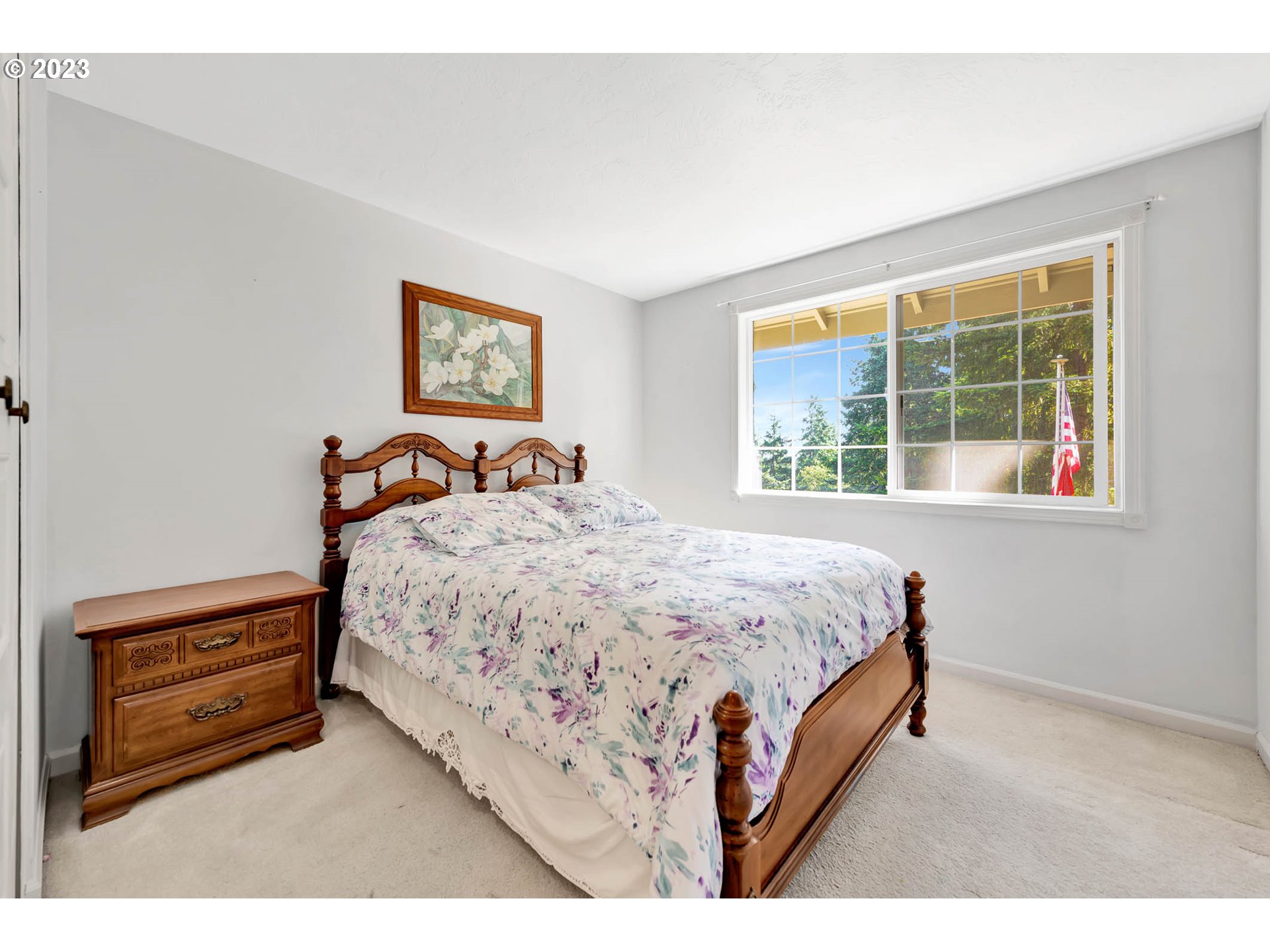 2817 Greentree Way Eugene, OR 97405 - Photo 21 of 44 a bedroom with a bed and a window
