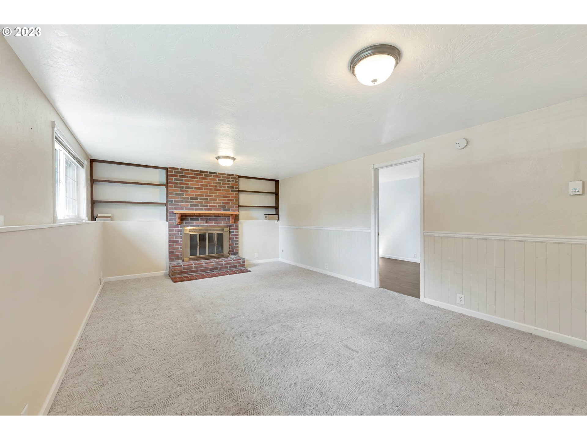 2817 Greentree Way Eugene, OR 97405 - Photo 30 of 44 a view of empty room with windows