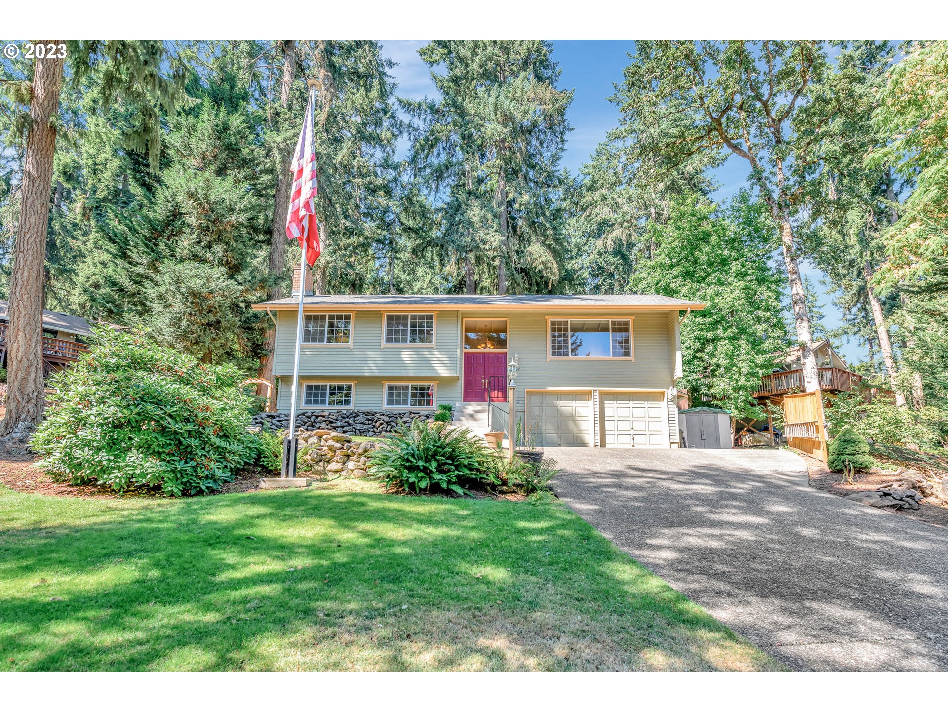 2817 Greentree Way Eugene, OR 97405 - Photo 3 of 44 a view of a house with a small yard and sitting area