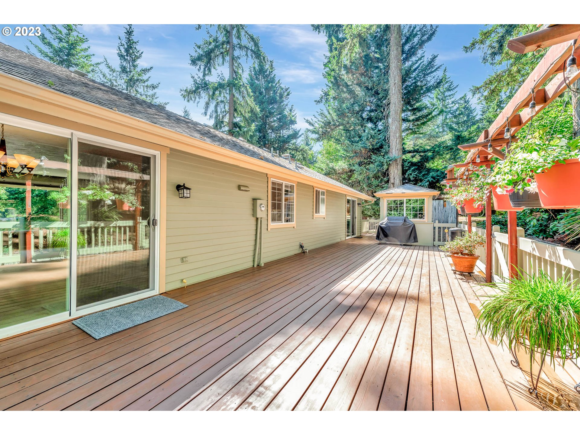 2817 Greentree Way Eugene, OR 97405 - Photo 39 of 44 a view of outdoor space with deck and plants