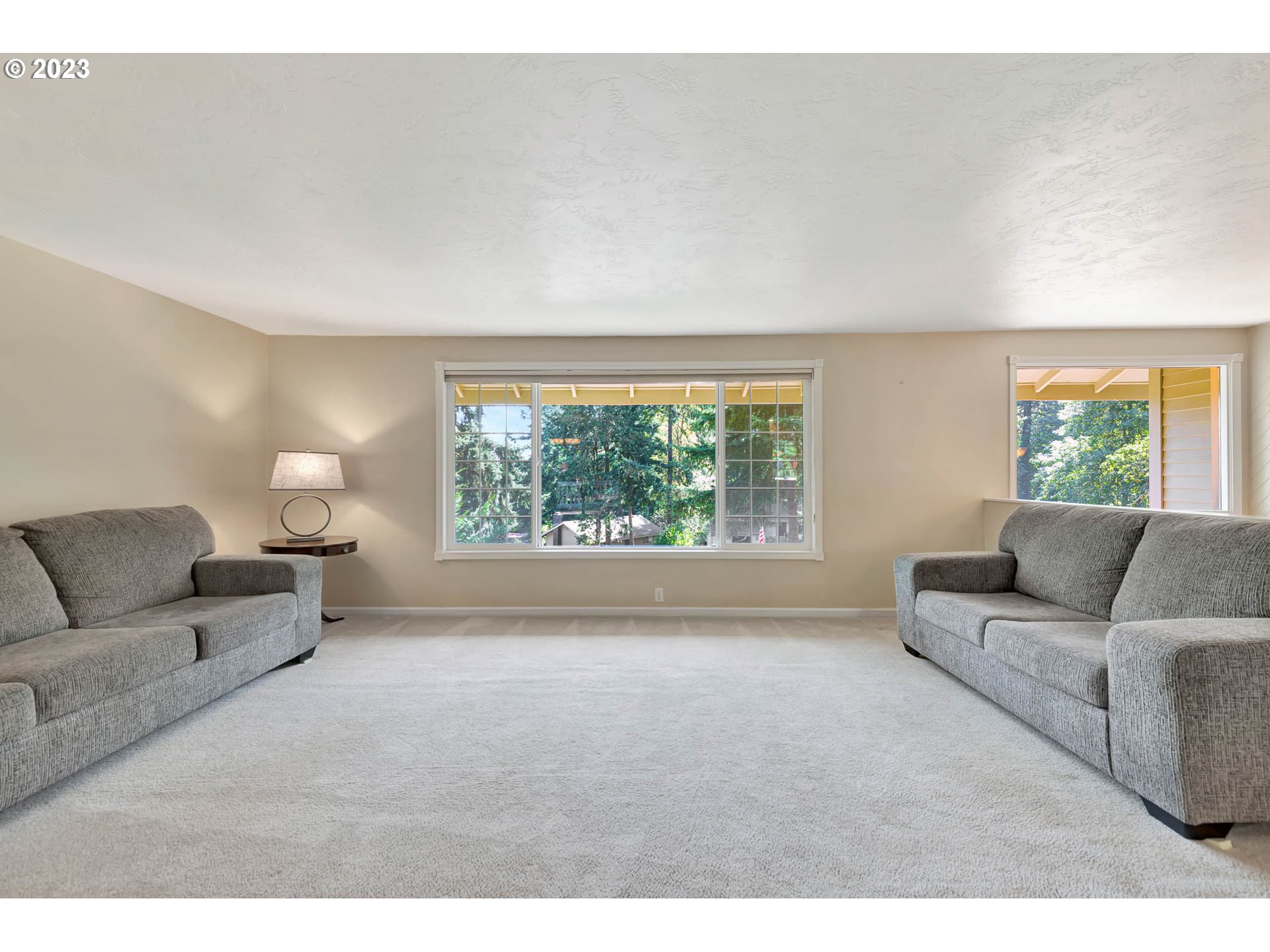 2817 Greentree Way Eugene, OR 97405 - Photo 8 of 44 a living room with furniture and a large window