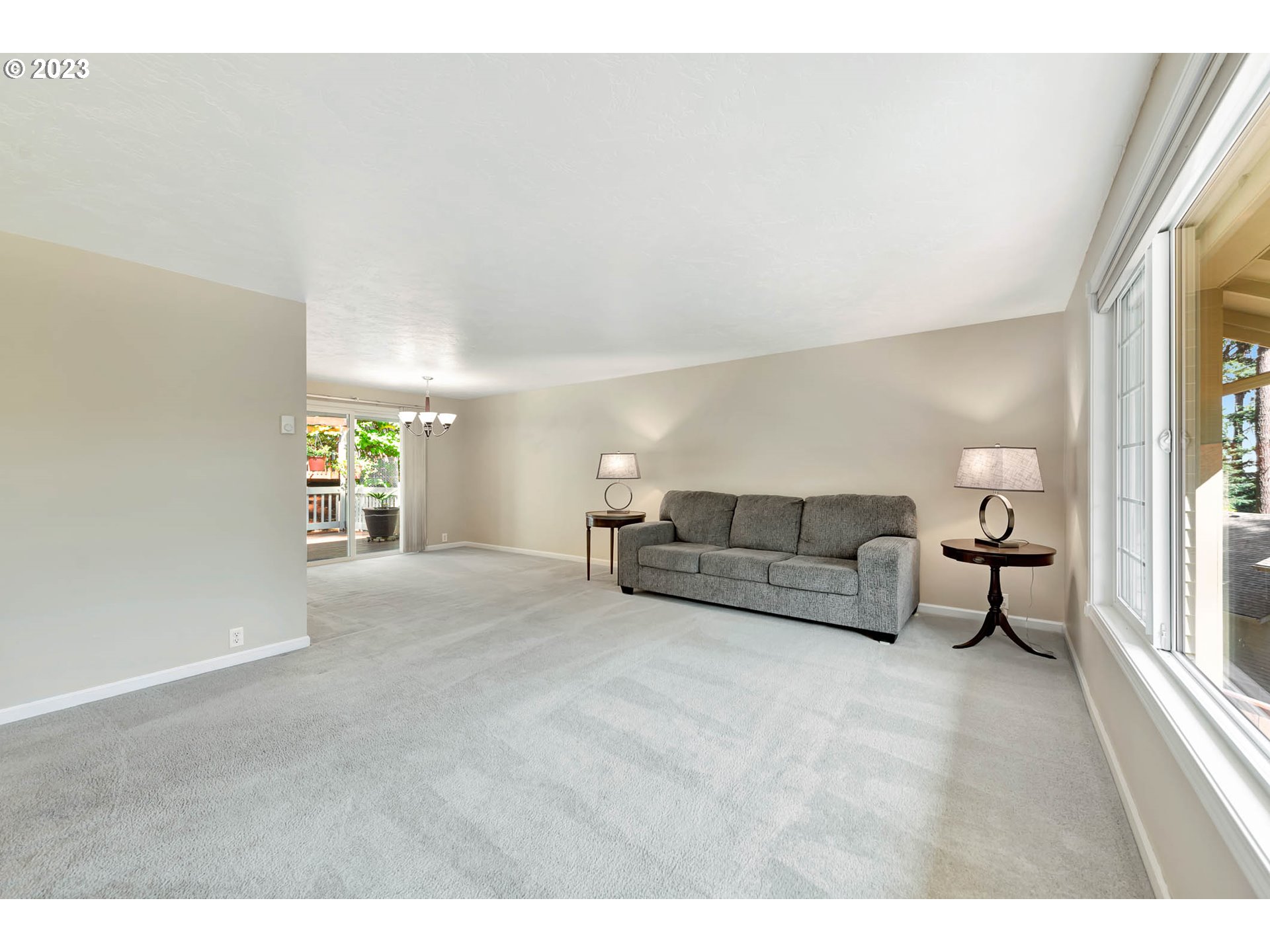 2817 Greentree Way Eugene, OR 97405 - Photo 10 of 44 a living room with furniture and a window
