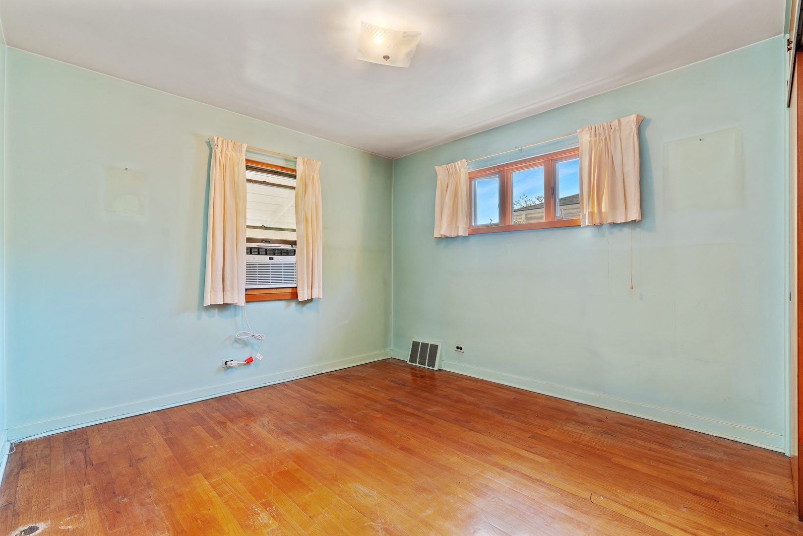 2219 Forest Avenue North Riverside, IL 60546 - Photo 6 of 10 a bedroom with a bed and a window