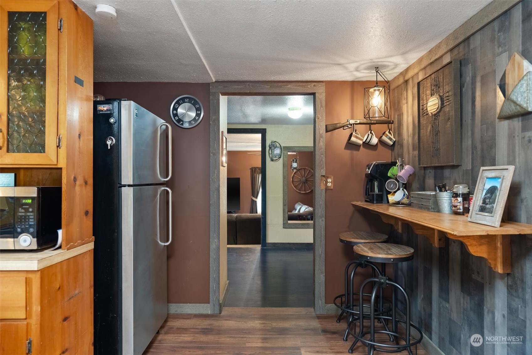 258 Coulson Road Chehalis, WA 98532 - Photo 11 of 37 a kitchen with stainless steel appliances a refrigerator and cabinets