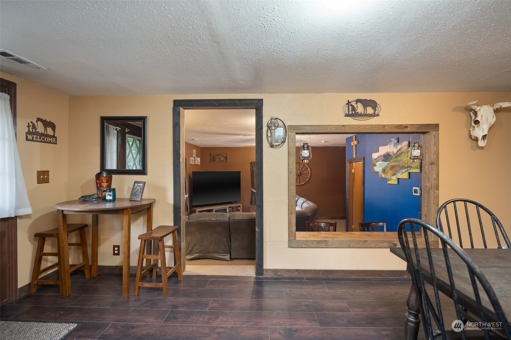 258 Coulson Road Chehalis, WA 98532 - Photo 12 of 37 a view of a livingroom with furniture and a flat screen tv