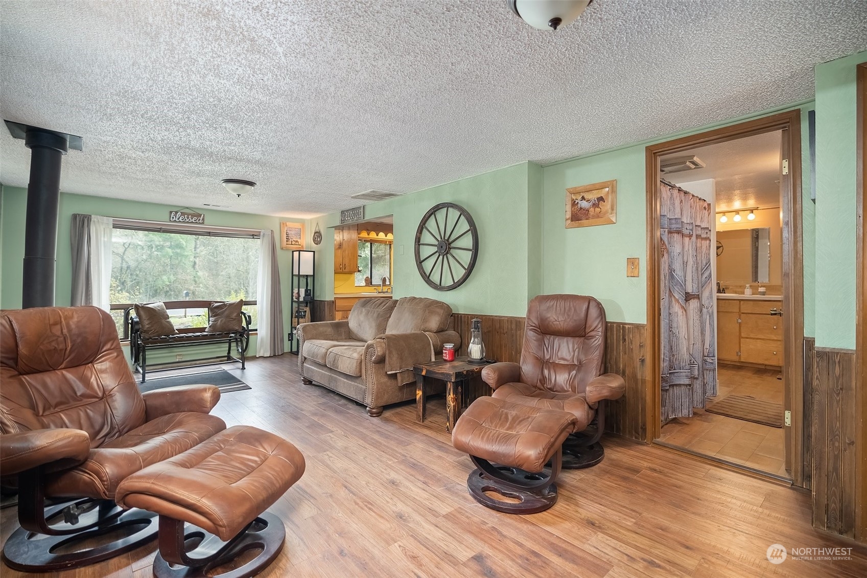 258 Coulson Road Chehalis, WA 98532 - Photo 18 of 37 a living room with furniture and a large window