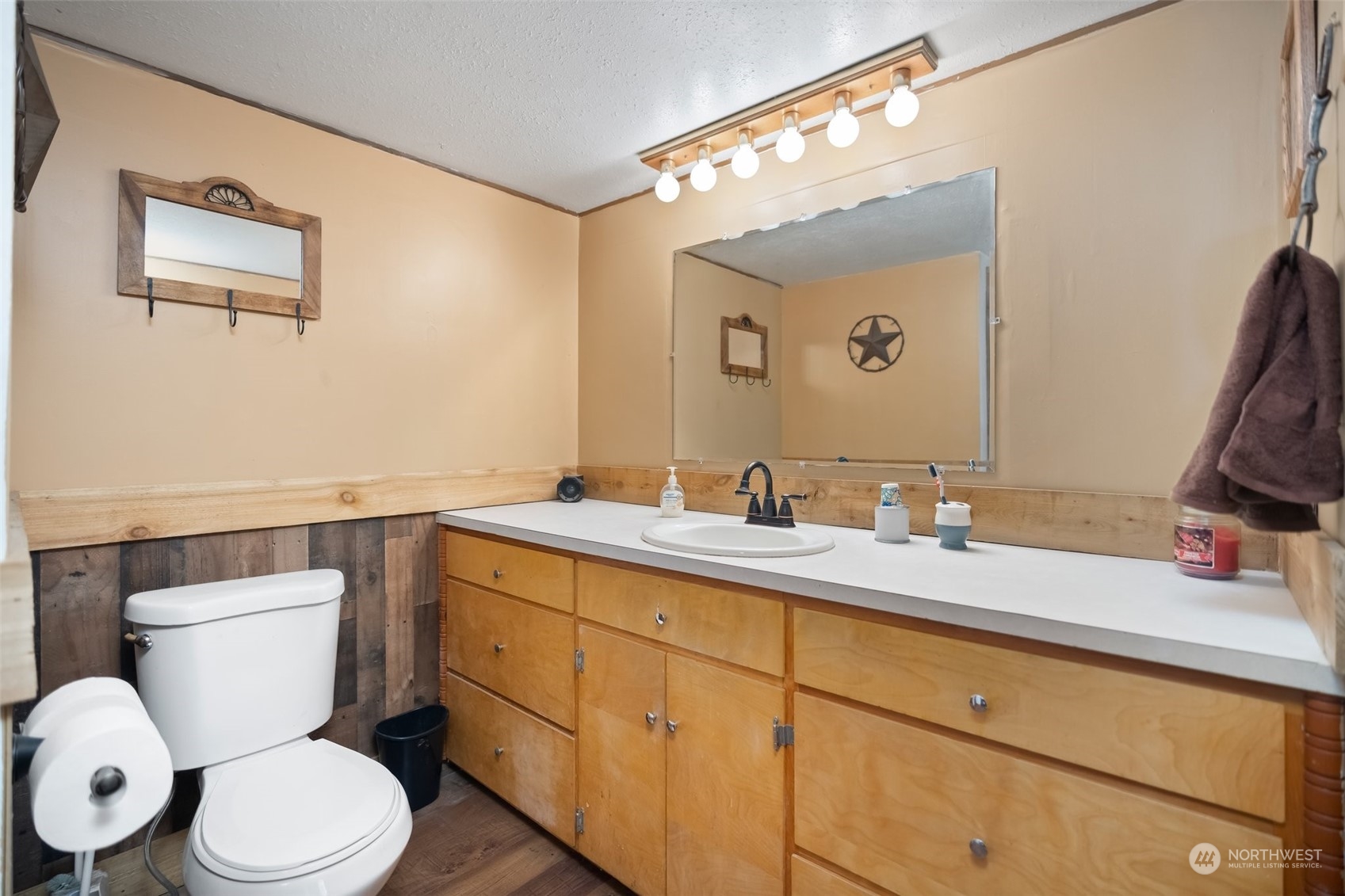 258 Coulson Road Chehalis, WA 98532 - Photo 19 of 37 a bathroom with a granite countertop sink mirror vanity and toilet