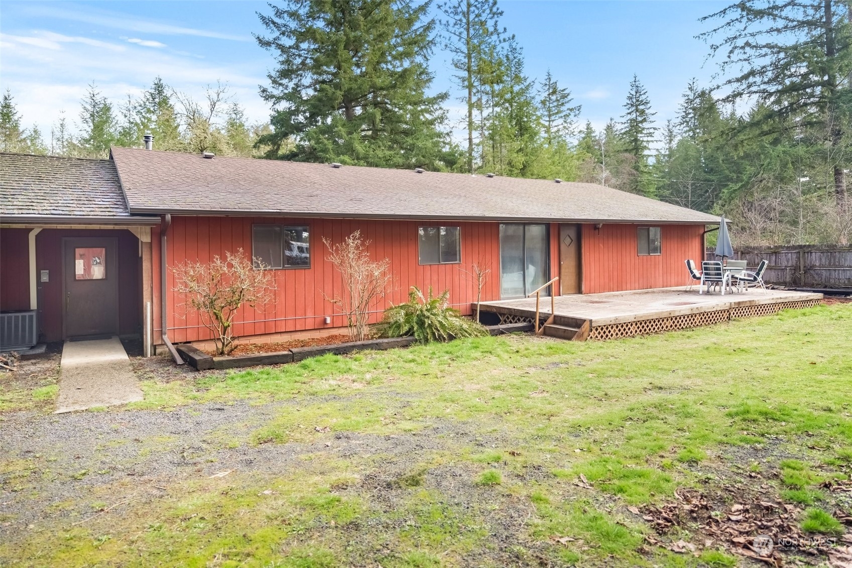 258 Coulson Road Chehalis, WA 98532 - Photo 26 of 37 a front view of house with yard and trees in the background